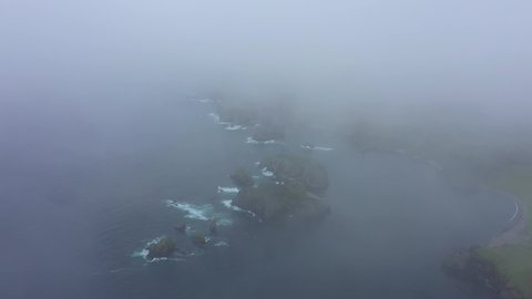 Flying Through a Clouds in Beautiful Unnamed Bay, Shikotan Island, Lesser Kuril Chain, Coastline of Pacific Ocean, Russia.