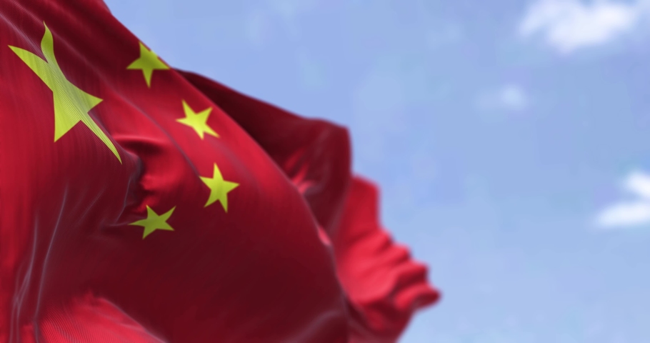 Detailed close up of the national flag of China waving in the wind on a clear day. Democracy and politics. Asian country. Selective focus. Seamless Slow motion Royalty-Free Stock Footage #1085247929