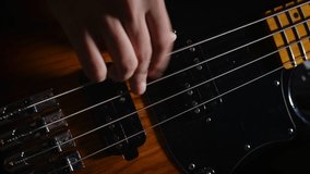 Practicing with the Music Instrument Bass Guitar - Powered by Shutterstock - Get 15% off with code: PIKWIZARD15