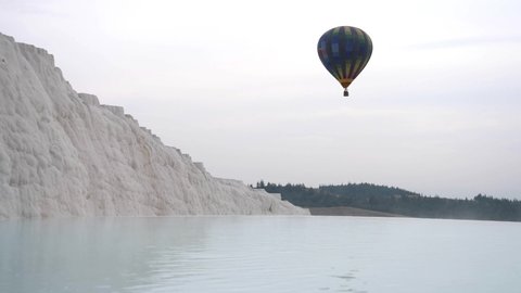Pamukkale is a tourism region of unique beauty with its travertines, white color and turquoise thermal water, and offers a unique experience to visitors with flying hot air balloons.