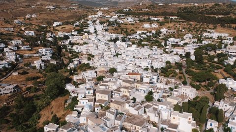Aerial Shot Of Paros Island, Greece. Flying Above White Houses.