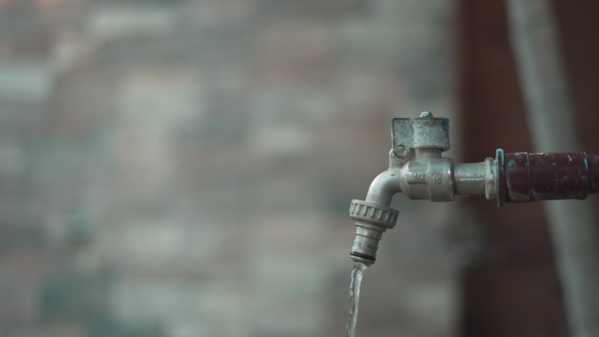 save water. Woman found Some people forgot turn off water. Turn off the water after not use for saves energy and save money reduces global warming. Royalty-Free Stock Footage #1085273372