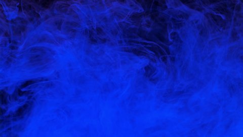 Blue ink acrylic paint mixing in water, swirling softly underwater. Colored acrylic cloud of paint in aquarium. Slow motion abstract smoke explosion animation. Beautiful art background