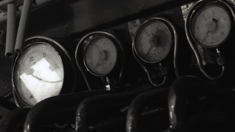 Nagoya.Japan-October 31.2019: Closeup shot of an antique locomotive at a railway museum in Nagoya Japan. Old transportation technology. Steam engine. Camera slowly turning right.