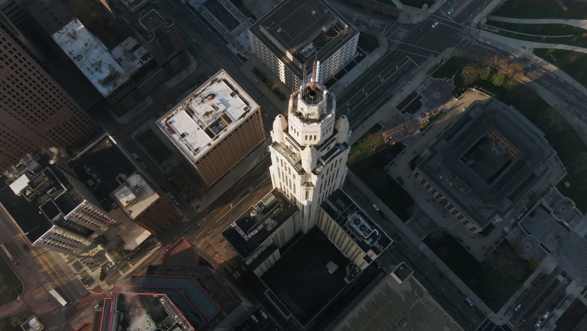 Aerial view overlooking the Leveque Tower, in sunny Columbus - descending, drone shot