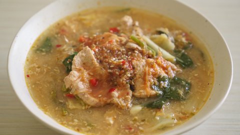 Sukiyaki Soup with Pork in Thai Style or boiled vermicelli with pork and vegetables in sukiyaki soup - Asian food style