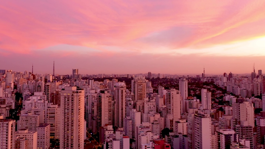 Sunset cityscape of Sao Paulo Brazil. Downtown historic center. Metropolis landscape of landmark city. Buildings and avenues at historic center of city.