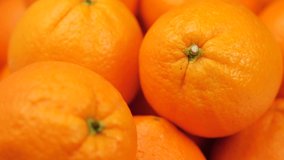 Orange fruit. Camera slowly moves up to show close-up of fresh oranges - Powered by Shutterstock - Get 15% off with code: PIKWIZARD15