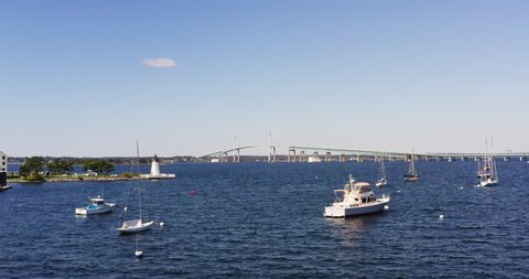 Aerial footage of harbor, marina, boats in Newport, RI.