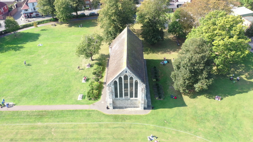 Small chapel in the middle of a park, surrounded by trees