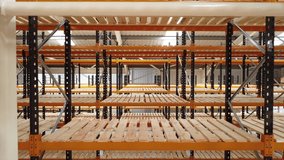 Empty orange shelves in a warehouse - Powered by Shutterstock - Get 15% off with code: PIKWIZARD15