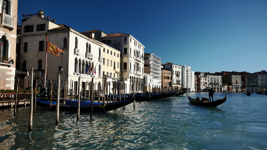 Venice, Italy - January 2022 - Traveling on the public transport boat, along the Grand canal, among the historic buildings of the lagoon city