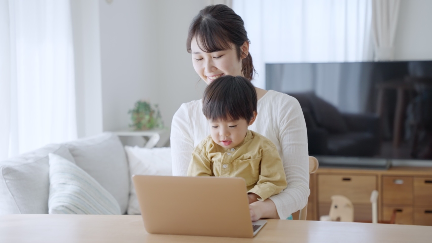 Parent who work at home with child | Shutterstock HD Video #1085376356