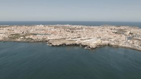 Fort of Peniche against cityscape and Atlantic Ocean. Aerial view