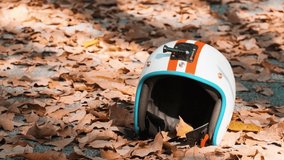 video slowmotion a helmet lying on the ground in the fall