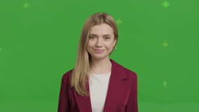 Happy smiling young business woman on Green Screen, Chroma Key. 4k raw video footage