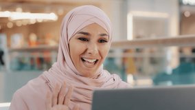 Young arab businesswoman having video conference using laptop at office desk girl manager communicates advises client via web chat muslim female teacher student talking via webcam distance learning