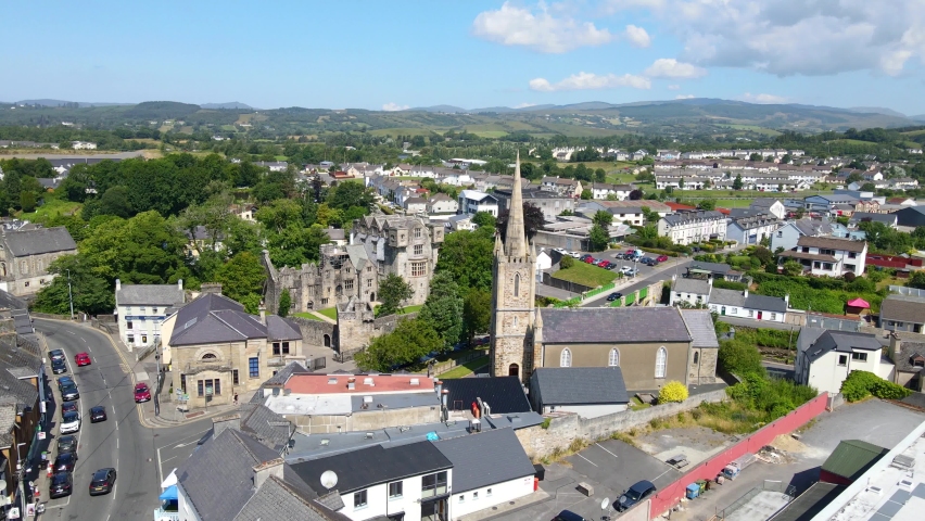Aerial view over town of Donegal. A beautiful location at the mouth of the River Eske and Donegal Bay, which is overshadowed by the Blue Stack Mountains. Donegal, County Donegal, Ireland. Royalty-Free Stock Footage #1085420777