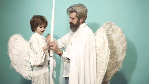 Angels father and son cupid valentin with bow arrow ready to shoot. Parenting, parent with child boy, childhood.