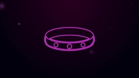Glowing neon line Gold ring icon isolated on black background. 4K Video motion graphic animation.