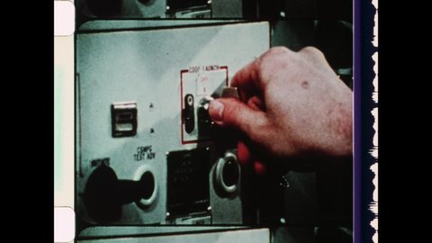 1962 Mead, NE.  Minuteman site, nuclear missile silo, on the Great Plains. Close Up view of launch key inserted in the launch panel. Ballistic Missile Launch. 4K Overscan of Archival Newsreel 