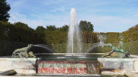 Versailles, France - October 17, 2021: Daybreak Fountain (fontaine du point du jour) in the gardens of the Chateau de Versailles.