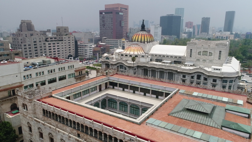 Aerial shot of the capital of Mexico, with the Palace of Fine Arts and the Latin American tower skyscraper "Torre Latinoamericana"