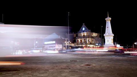 Jogjakarta, Indonesia - Dec 13,, 2021: Busy Night Street At White Paal (Tugu Jogja) an Icon of Jogja