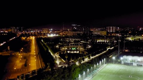 Krasnodar, Russia - August 28, 2020: Public park - Krasnodar. Flying over the park at night, Aerial View Hyperlapse