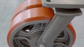 New, powerful rollers for heavy-duty industrial trolleys. Shot in motion. Closeup - Powered by Shutterstock - Get 15% off with code: PIKWIZARD15