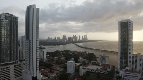 aerial view of Panama city on a cloudy stormy day, pullback wide shot