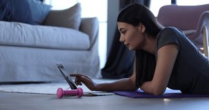 woman exercising online at home