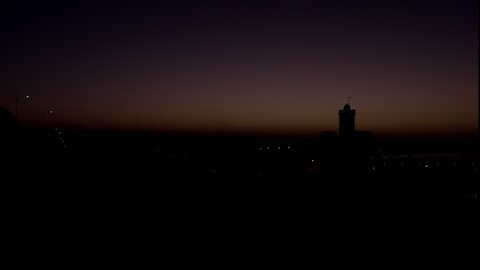 Time-lapse of sun rising over mosque in Agadir Morocco