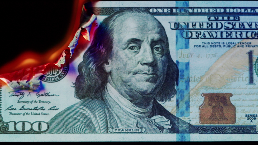 Burning American hundred dollar banknote on black background. Flame of fire from cash close-up. Financial crisis and depressed economy. Paper money loss concept.  Royalty-Free Stock Footage #1085499245
