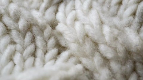 White knitted wool background extreme close up stock footage