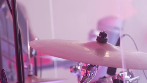 Close up of a professional musician beating the drum. 
