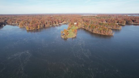 Aerial Drone View of Lake Anna with Fall Trees with Foliage along the Shore 