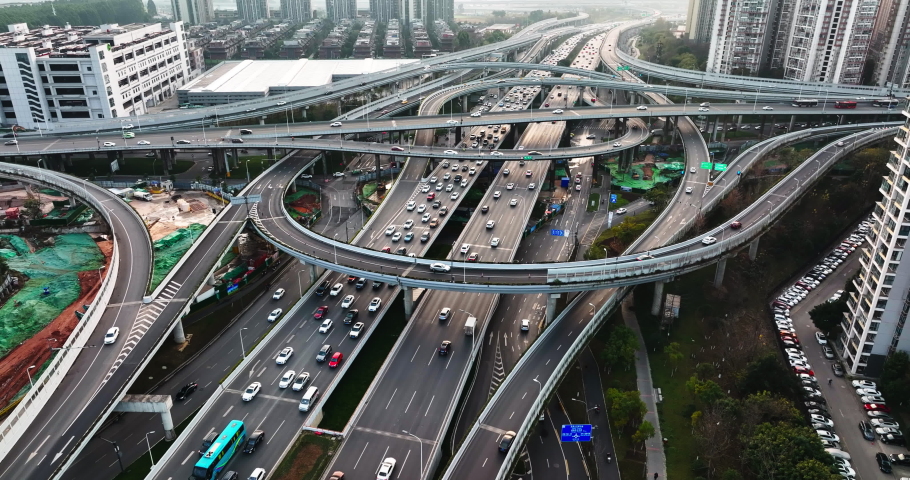Aerial view of busy city traffic on the road cars driving on the overpass third ring road during rush hour of Chengdu China multi-storey highway | Shutterstock HD Video #1085531465
