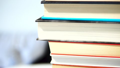 video of stack of books,ing shoot. super close-up details
