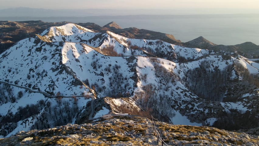 Stunning hiking trail on snowy white mountains with Adriatic Sea view, Sveti Jure, Park prirode Biokovo