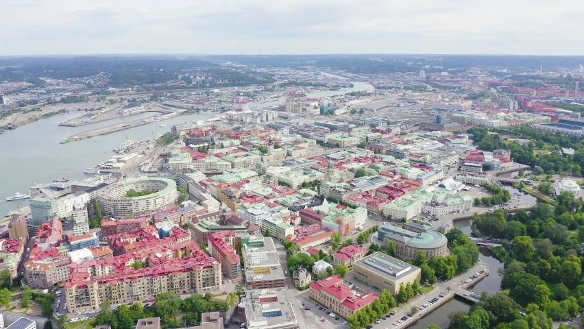 Inscription on video. Gothenburg, Sweden. Panorama of the city central part of the city. Cloudy weather. Flames with dark fire, Aerial View