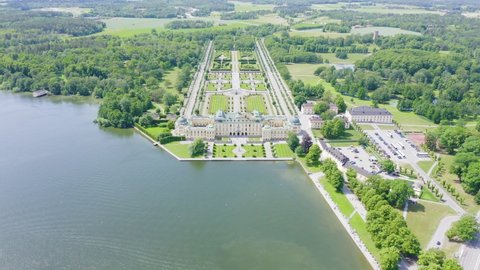 Stockholm, Sweden - June 23, 2019: Drottningholm. Drottningholms Slott. Well-preserved royal residence with a Chinese pavilion, theater and gardens, Aerial View Hyperlapse