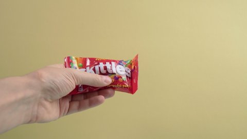 Tyumen, Russia-December 27, 2021: Skittles is a fruit flavoured sweets. Wrigley Jr. Company.