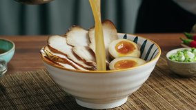 Japanese Ramen asian soup noodle with Beef or chicken meat, mushroom and eggs, chef cooking in traditional korean chinese food. Close up of tasty vietnamese cuisine.  - Powered by Shutterstock - Get 15% off with code: PIKWIZARD15