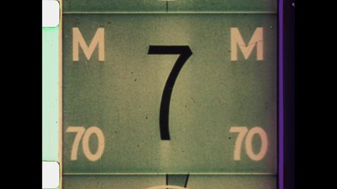 Universal Countdown Leader, Picture Start. 4K Overscan of 16mm Film Showing Frame Lines and Edge Bleed. Black  White, Blue Tint Universal Countdown Leader from 8 to 2. Vintage Countdown Clock. 