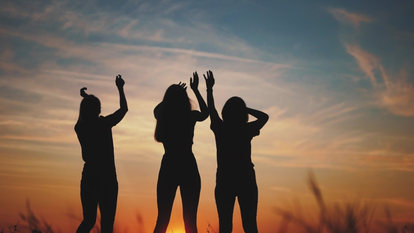 Party in the park in nature. nightclub on open air dance concept. happy family a resting in fun nature travel. festival at night in the park. silhouette of a girl dancing in the evening at sunset | Shutterstock HD Video #1085561288