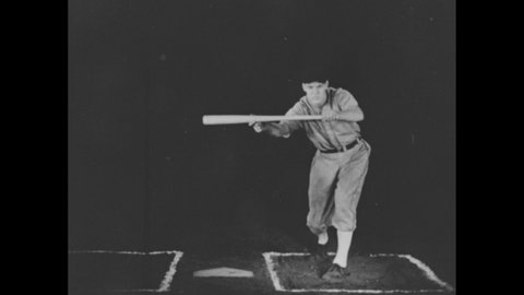 1940s: Baseball player swinging bat, holding bat in bunting position. Player positioning bat by arrow. Shots of hands holding bat.