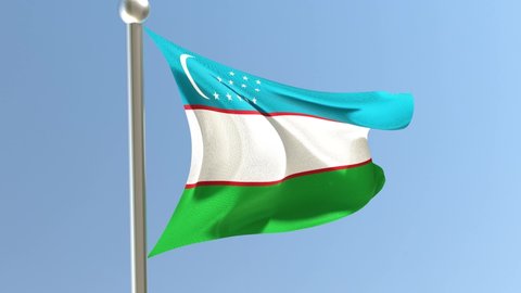 Uzbek flag on flagpole. Uzbekistan flag fluttering in the wind.