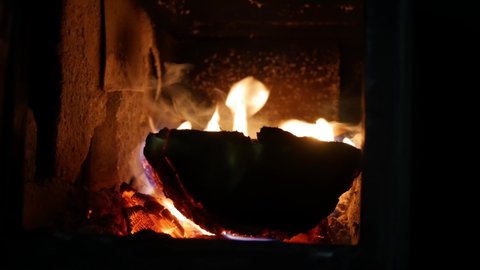 Burning Log Fire Flames. Cozy relaxing fireplace.