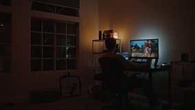 Professional color grading specialist edit raw ungraded files on computer. Editing and grading pro work from home on freelance basis. Late night editing of important project - Powered by Shutterstock - Get 15% off with code: PIKWIZARD15
